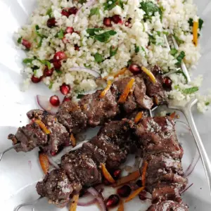Honey and pomegranate glazed lamb skewers