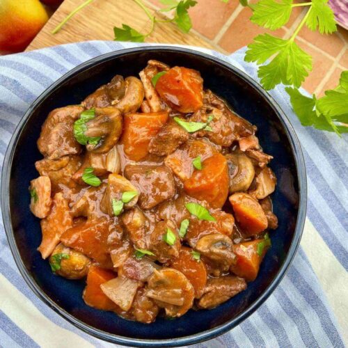 Gluten free beef bourguignon in blue bowl